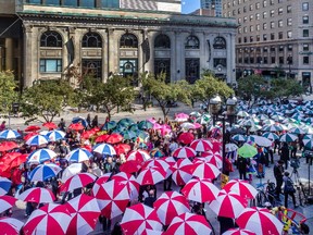 Montrealers took the streets with their umbrellas to launch the annual Centraide fundraising campaign on Thursday, October 2, 2014.