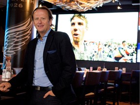 Jean Bédard , president of Cage aux Sports and Sportscene Group stands in the main dining room of the Bell Centre location of Cage aux Sports in Montreal on Thursday September 25, 2014.