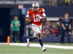 Ohio State quarterback Cardale Jones runs the ball against the Oregon Ducks during the College Football Playoff National Championship Game on Jan. 12, 2015 in Arlington, Texas.