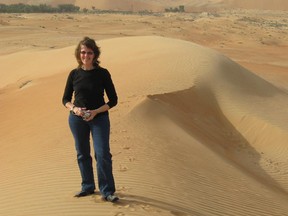 Denise Roig in the desert outside Liwa, near Abu Dhabi, U.A.E. “We have a love-hate relationship with the place, for sure,” she says of the time her family spent in Abu Dhabi from 2008 to 2011. “We remember how disappointed and disillusioned we were, but still we get misted up about it probably once a week.”