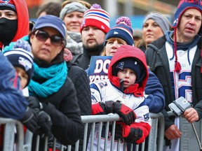 Fans attend the New England Patriots Send-Off Rally at City Hall Plaza on January 26, 2015 in Boston, Massachusetts. The Patriots will face the Seattle Seahawks in Superbowl XLIX on Sunday. (Photo by Maddie Meyer/Getty Images)
