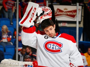 Carey Price settles in for the Canadiens' game against the New York Islanders at Nassau Veterans Memorial Coliseum on Dec. 23, 2014 in Uniondale.