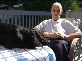 Richard "Jack" Bennett, 84, with family dog Pipi in Châteauguay.