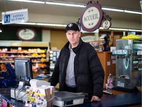 Christian Morin, grocery store owner and witness of the deadly 2014 fire at the Résidence du Havre, poses for a photograph outside his store in the village of L'Isle-Verte, 465 kilometres east of Montreal, on Thursday, January 22, 2015. Morin said he knew all of the victims well. On January 23, 2014 a fire killed 32 people at the Résidence du Havre senior's home.
