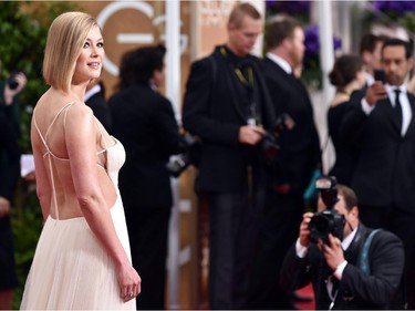 Rosamund Pike arrives at the 72nd annual Golden Globe Awards in a Vera Wang gown at the Beverly Hilton Hotel on Sunday, Jan. 11, 2015, in Beverly Hills, Calif.