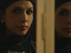 Screen grab from the documentary Muneeza in the Middle, which documents Muneeza Sheikh's struggle to reconcile her devout Muslim beliefs with her life as a stylish, dynamic Toronto lawyer.