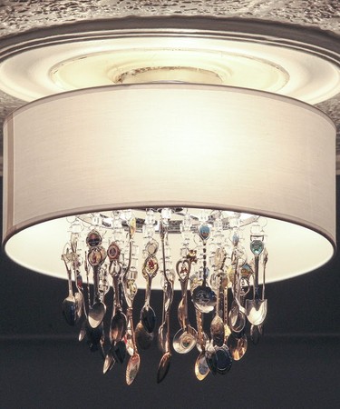 A chandelier made of spoons that Lunsford made for the dining room.