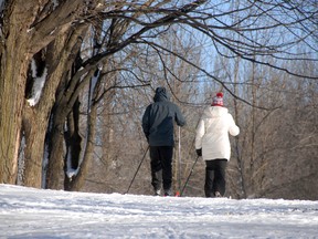 Cross-country skiers make their way over the sparse coating of snow and ice on Mont-Royal Park, Thursday, December 29, 2011. Temperatures dropped to a chilly -17 during the day in the city.