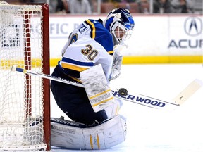 St. Louis Blues goalie Martin Brodeur makes a save against the Anaheim Ducks during game at the Honda Center on Jan. 2, 2015 in Anaheim, Calif.