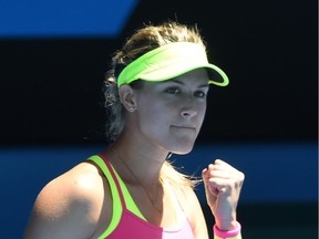 Canada's Eugenie Bouchard celebrates after victory in her women's singles match against France's Caroline Garcia on day five of the 2015 Australian Open tennis tournament in Melbourne on January 23, 2015.