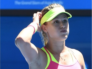 Canada's Eugenie Bouchard reacts as she celebrates after victory in her women's singles match against France's Caroline Garcia on day five of the 2015 Australian Open tennis tournament in Melbourne on January 23, 2015.