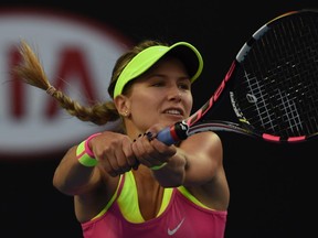 Canada's Eugenie Bouchard hits a return against Netherland's Kiki Bertens during their women's singles match on day three of the 2015 Australian Open tennis tournament in Melbourne on January 21, 2015.