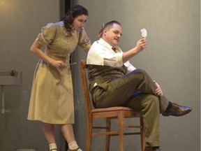 A scene from Le Journal d'Anne Frank at Théâtre du Nouveau Monde until Feb. 13, 2015: Mylène St-Sauveur is superb as Anne Frank; Paul Doucet warms up in his papa role as Otto Frank.