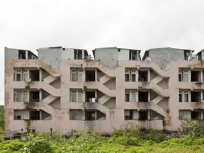 The concrete structure is a typical migrant housing in Surat, a city in the state of Gujarat, India. In 2013, Bijoy Jain proposed the extension of the building's perimeter to create open-air passages to allow better circulation of fresh air and light.