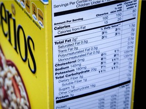The nutrition facts label on the side of a cereal box is photographed in Washington, Thursday, Jan. 23, 2014.