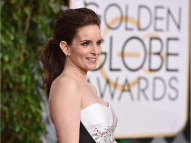 Tina Fey arrives at the 72nd annual Golden Globe Awards at the Beverly Hilton Hotel on Sunday, Jan. 11, 2015, in Beverly Hills, Calif.
