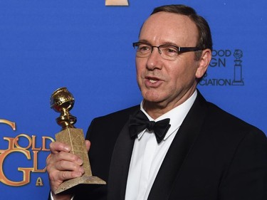 Actor Kevin Spacey poses with the award for Best Actor - TV Sereis, Drama for his role in "House of Cards," in the press room at the 72nd annual Golden Globe Awards, January 11, 2015 at the Beverly Hilton Hotel in Beverly Hills, California.