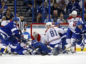 The Lightning's Victor Hedman (77) reaches for a rebound to score on Canadiens goalie Carey Price during game on Oct. 13, 2014, in Tampa, Fla.