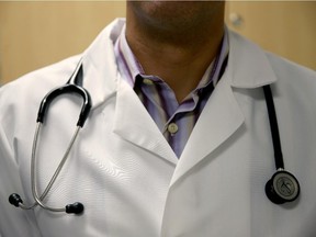 A doctor wears a stethoscope.