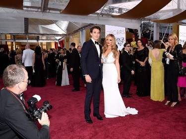 Actor Miles Teller (left) and model Keleigh Sperry attend the 87th Annual Academy Awards Feb. 22, 2015.