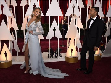 Model Chrissy Teigen and musician John Legend attend the 87th Annual Academy Awards Feb. 22, 2015.