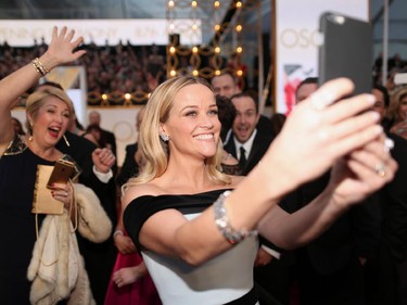 Actress Reese Witherspoon takes a selfie at the 87th Annual Academy Awards Feb. 22, 2015.
