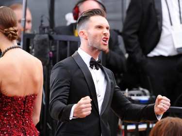 Adam Levine arrives at the Oscars on Sunday, Feb. 22, 2015, at the Dolby Theatre in Los Angeles.