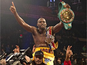 Adonis Stevenson celebrates his victory against Dmitri Sukhotskiy to defend his WBC light-heavyweight championship on Dec. 19, 2014 at the Pepsi Colisée in Quebec City.