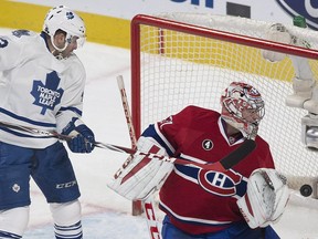 Montreal Canadiens goaltender Carey Price is scored on by Toronto Maple Leafs' Daniel Winnik (not shown) as Maple Leafs' Nazem Kadri looks on during first period NHL hockey action in Montreal, Saturday, February 14, 2015.