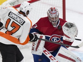 Canadiens goalie Carey Price stops a shot by the Philadelphia Flyers' Wayne Simmonds during game at the Bell Centre on Nov. 15, 2014.