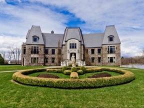 French Normand-style château built on a private island by singer Céline Dion and her husband, René Angélil, includes six bedrooms, a formal living room, dining room seating 18, custom kitchen, custom fireplaces, sun rooms and an office.