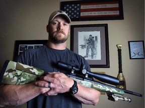 FILE - In this April 6, 2012 file photo, Chris Kyle, a former Navy SEAL and author of the book American Sniper, poses in Midlothian, Texas. Jury selection begins Monday, Feb. 9, 2015, for the upcoming trial of former Marine Eddie Ray Routh, who is charged with capital murder in the shooting deaths of Kyle and Kyle's friend, Chad Littlefield.