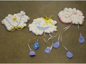 Construction paper and cotton ball clouds designed by Penny, Isabelle and Jilly.
