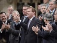 Foreign Minister John Baird receives a standing ovation in the House of Commons in Ottawa on Tuesday, Feb. 3, 2015. Baird announced his resignation. But have we seen the last of Baird as a politician?