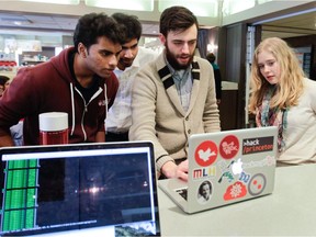 McGill students, from left, Deepanjan Roy, Shivan Kaul, Amiel Kollek and Clare Lyle at the university's student union building Feb. 19, 2015, in Montreal. They are helping organize a hackathon at McGill.