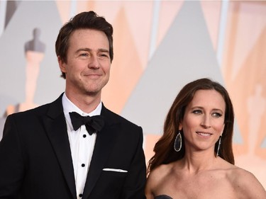 Edward Norton, left, and Shauna Robertson arrive at the Oscars on Sunday, Feb. 22, 2015, at the Dolby Theatre in Los Angeles.