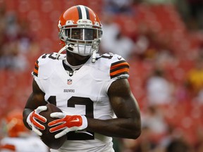 In this Aug. 18, 2014, file photo, Cleveland Browns wide receiver Josh Gordon warms up before an NFL preseason football game against the Washington Redskins in Landover, Md. Gordon's 10-game suspension for repeated violations of the NFL's drug policy is set to end Monday, Nov. 17 when the Pro Bowler will be allowed to rejoin his teammates after being exiled since September.