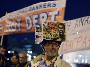 Greeks gather on Feb. 16, 2015, in front of the parliament during a pro-government demonstration in Athens. Greece rejected an opening EU bailout offer as "absurd" and "unacceptable."