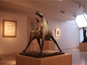 Inside the Landau Fine Art gallery on Sherbrooke St. W., one of two Montreal galleries owned by Robert Landau, who now lives in Switzerland. The sculpture is called Cavaliere by Marino Marini from 1952, and the drawing in the background is Tête de femme au collier by Henri Matisse from 1950.