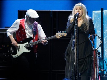 Singer Stevie Nicks of the band Fleetwood Mac performs beside bassist John McVie during the band's show at the Bell Centre in Montreal on Thursday, February 5, 2015.