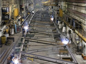 Joists for a Trois-Rivières sports complex being assembled in steel manufacturer Canam's  St, Gédeon de Beauce plant.