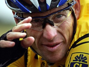 A file picture taken on July 8, 2004, Lance Armstrong during the fifth stage of the 91st Tour de France cycling race.