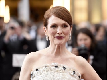Julianne Moore arrives at the Oscars on Sunday, Feb. 22, 2015, at the Dolby Theatre in Los Angeles.