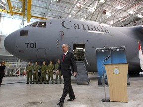 Minister of Defence Rob Nicholson leaves the podium following an announcement at Canadian Forces base Trenton in Trenton, Ont., on Friday Dec. 19, 2014.