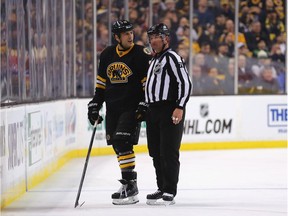 Milan Lucic of the Boston Bruins disputes a penalty call during the third period against the Montreal Canadiens at TD Garden on February 8, 2015 in Boston, Massachusetts.
