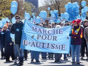 Blue balloons and Brazilian drummers, and close to 1,000 people marched in the Plateau Mont Royal to Parc Lafontaine, to raise awareness and funds for those with autism in Montreal, Saturday April 28, 2012.