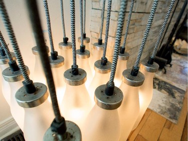 An art installation lamp made from milk bottles.