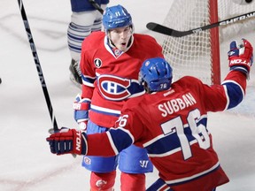 Brendan Gallagher of the Montreal Canadiens celebrates his first period goal against theToronto Maple Leafs with defenceman P.K. Subban in NHL action at the Bell Centre in  Montreal on Saturday, February 14, 2015.