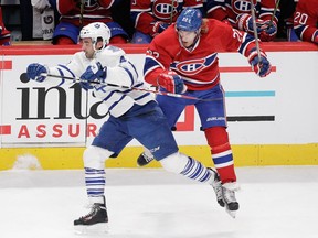 The Canadiens' Dale Weise collides with the Toronto Maple Leafs' Nazem Kadri during game at the Bell Centre on Feb. 14, 2015. The Canadiens won 2-1.