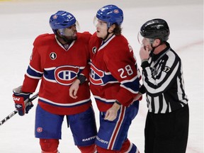 The Canadiens' P.K. Subban talks with Nathan Beaulieu after he fought David Clarkson of theToronto Maple Leafs during game at the Bell Centre on Feb. 14, 2015. The Canadiens won 2-1 in a shootout.